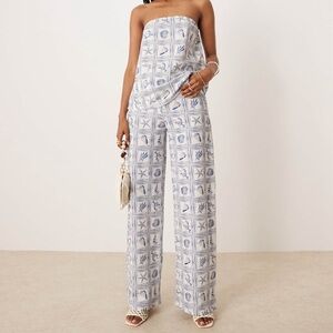 ASOS DESIGN wide leg pants in blue shell print - part of a set